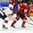 TORONTO, CANADA - JANUARY 2: Switzerland's Nico Hischier #18 carries the puck up the ice while USA's Erik Foley #14 stick checks during quarterfinal round action at the 2017 IIHF World Junior Championship. (Photo by Matt Zambonin/HHOF-IIHF Images)

